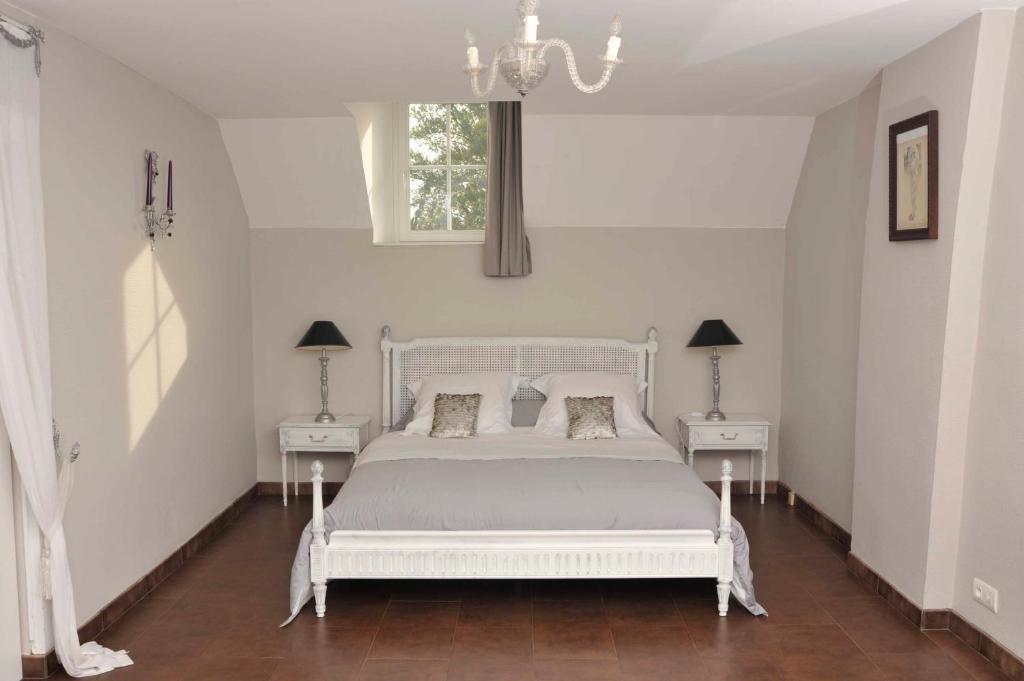 Chambres Et Tables D'Hotes Le Voriou Couddes Bilik gambar